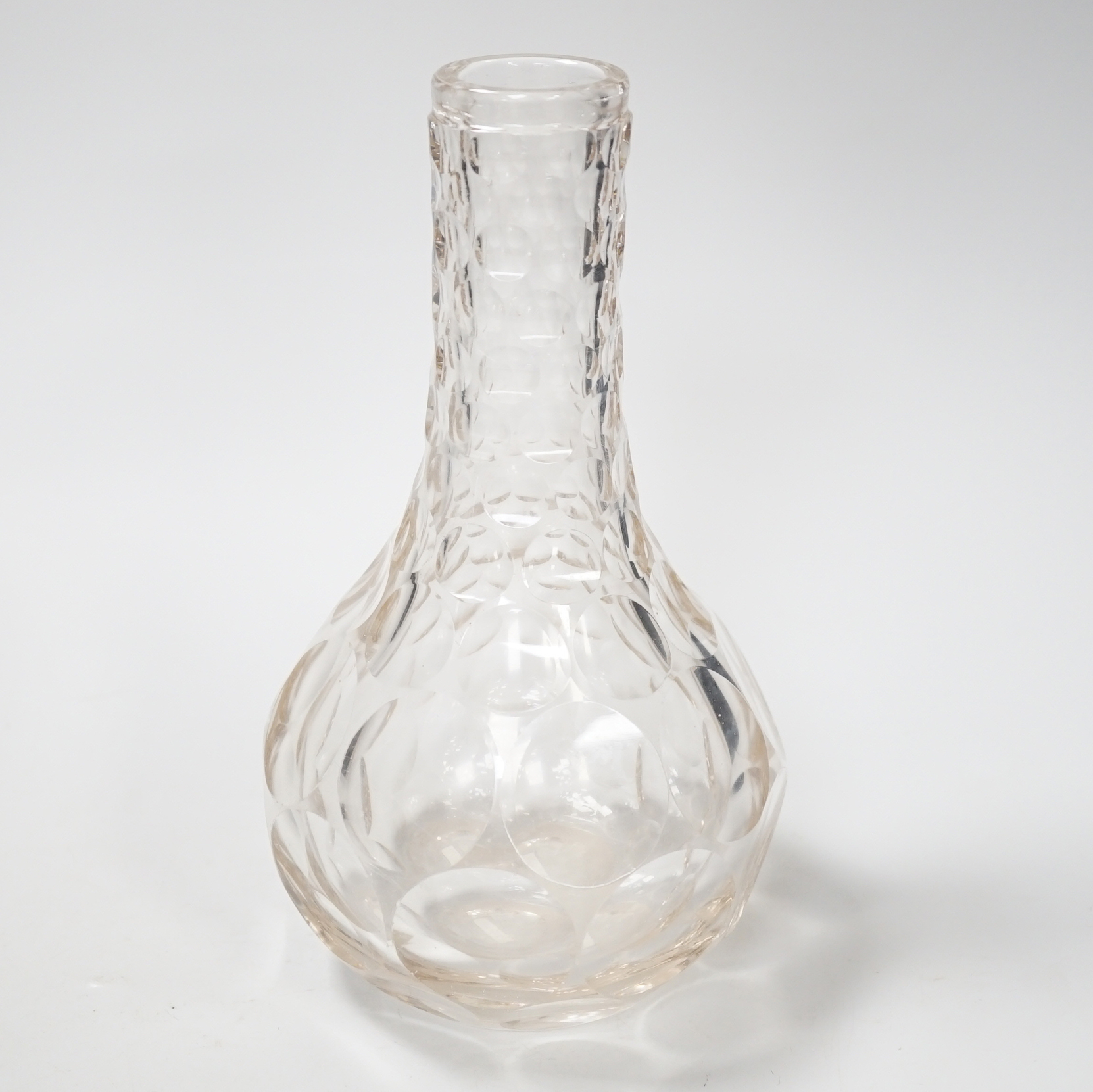 An English lead crystal shaft and globe carafe, decorated throughout with cut roundels or printies, grey dark coloured metal. early 19th century, 23cm high